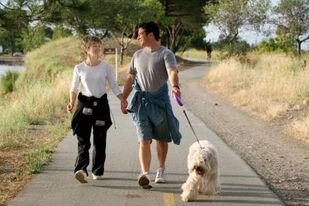 Walking outdoors with frequent lower back pain